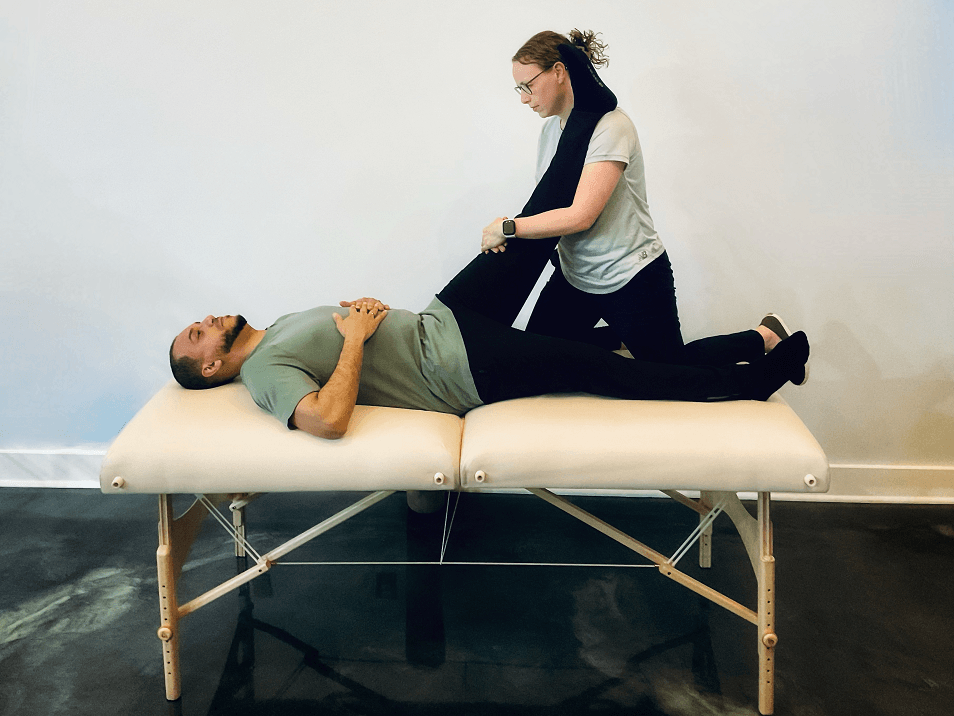 Dr.Ali-performing-Stretch-Therapy-to-his-male-patient